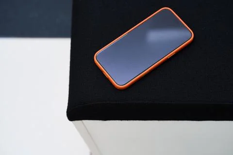 Smartphone on Black Surface - Modern Technology Shot Stock Photos