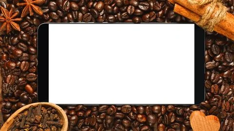 Smartphone with blank screen in frame of coffee Stock Photos