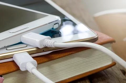 Smartphone on the book Stock Photos