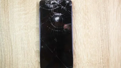 Smartphone with a broken screen. Cracked, damaged screen, broken,animation Stock Footage 336733035
