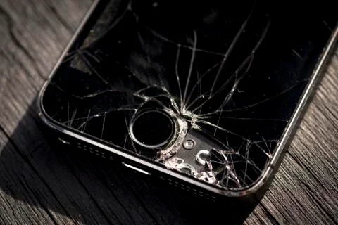 Smartphone with a Broken Screen Stock Photos
