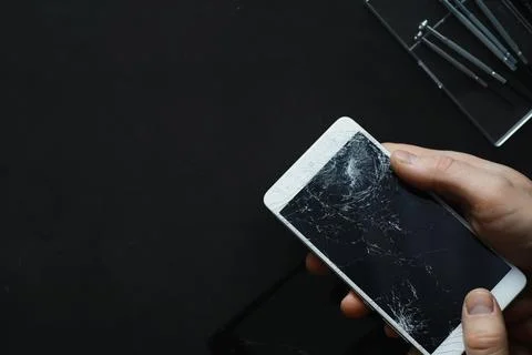 Smartphone with a broken touch screen. Mobile phone is broken. The phone cr.. Stock Photos