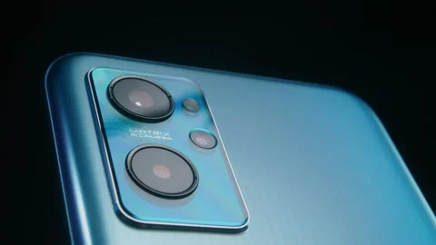 Smartphone camera lens close-up on a dark background plays with light.#2 Stock Footage 169690004