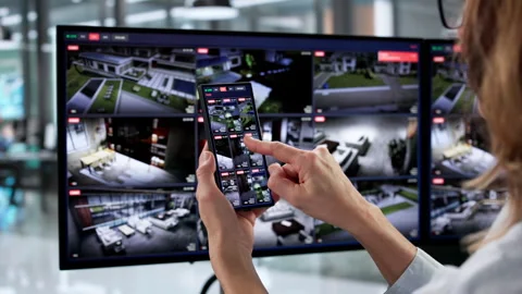 Smartphone CCTV App With Surveillance Camera Monitoring Video stock 329680794