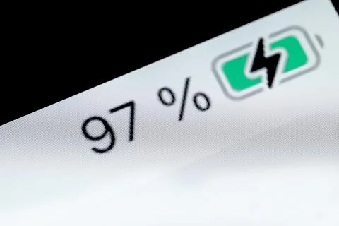 Smartphone charged battery level indicator - 97 percent: close up macro Stock Photos