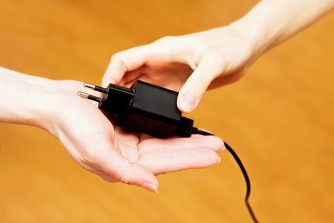 Smartphone charger transfer process. Foto stock