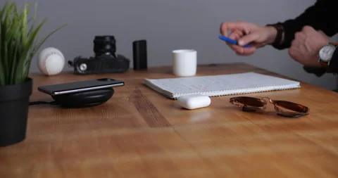 Smartphone Charging With Wireless Charger	 Stock Footage 143558633