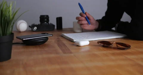 Smartphone Charging With Wireless Charger	 Stock Footage 143558802