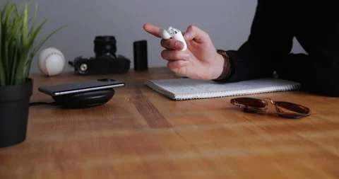 Smartphone Charging With Wireless Charger	 Stock Footage 143558819