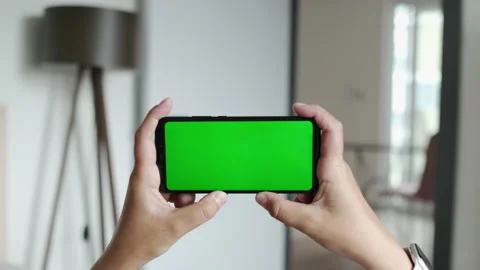Smartphone Chroma Key Green Screen or Mock Up Display in Horizontal Orientation Stock Footage 194691658