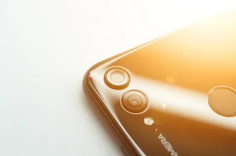 Smartphone close-up. Dual main camera mobile phone. Selective focus, white Stock Photos