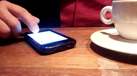 Smartphone at coffee Stock Footage 34623865