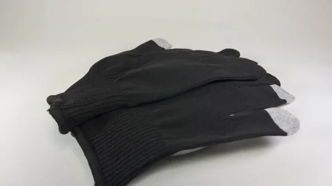 Smartphone compatible gloves Stock Footage 147836009
