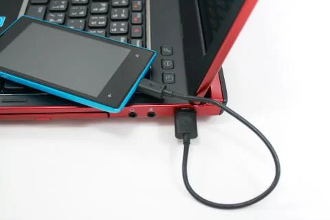 Smartphone is conecting to a laptop Stock Photos