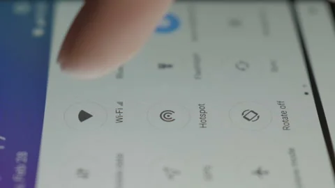 Smartphone connecting to WiFi. Tablet lying on a table connects to wifi. Clos Stock Footage 114549909