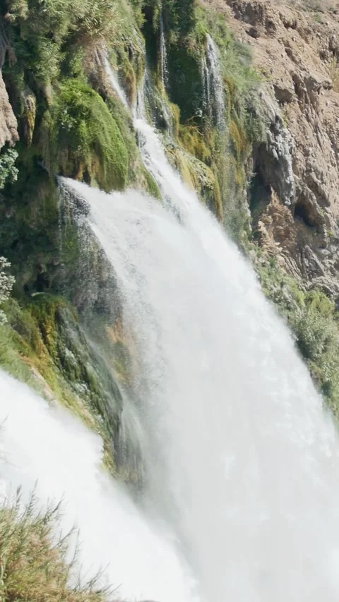 Smartphone content featuring a close-up of a roaring natural waterfall again Stock Footage 334628303