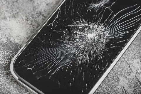 Smartphone with cracked screen Stock Photos
