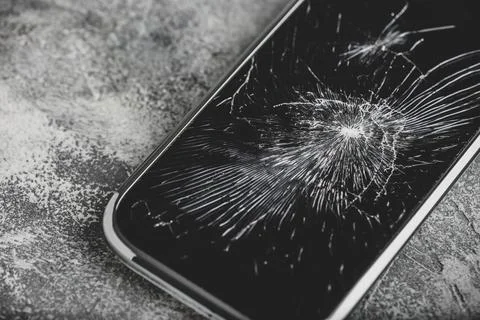 Smartphone with cracked screen Stock Photos