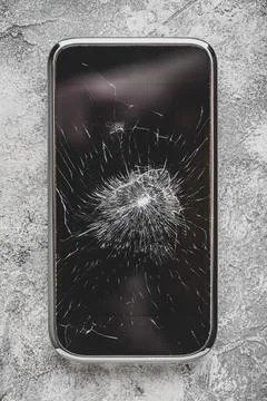 Smartphone with cracked screen Stock Photos