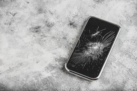 Smartphone with cracked screen Stock Photos