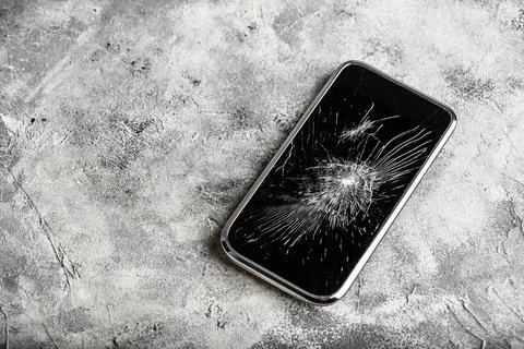 Smartphone with cracked screen Foto stock