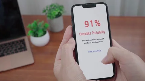 Smartphone Deepfake Detection Alert Showing 91 Percent Manipulation Risk Stock Footage 343972564