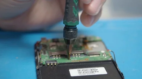 Smartphone disassembling in repair shop Stock Footage 113675227