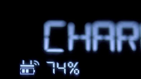 Smartphone display with charging battery status Stock Footage 100433670