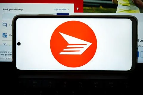 Smartphone displaying canada post logo showing mail delivery Photos