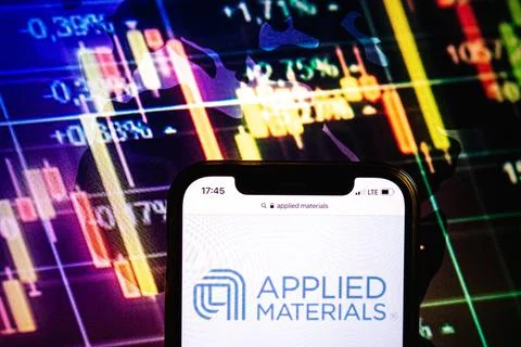 Smartphone displaying logo of Applied Materials company Stock Photos