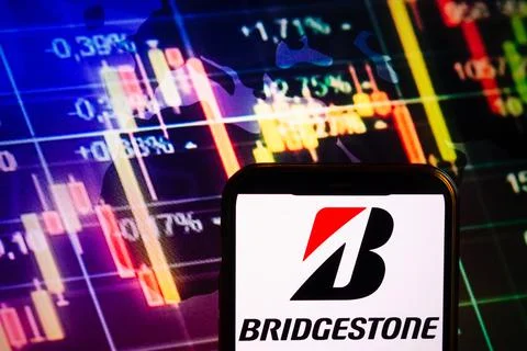 Smartphone displaying logo of Bridgestone Stock Photos