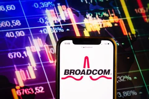 Smartphone displaying logo of Broadcom Inc Stock Photos