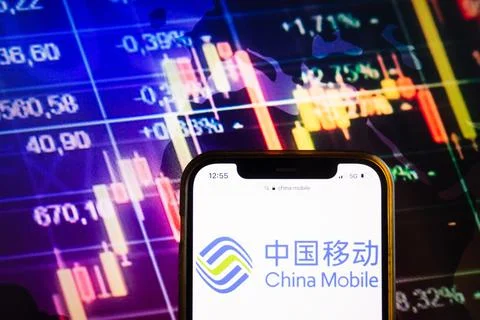 Smartphone displaying logo of China Mobile Ltd company Stock Photos