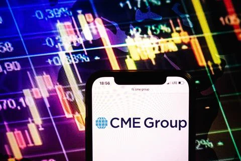 Smartphone displaying logo of CME Group Stock Photos