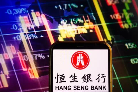 Smartphone displaying logo of Hang Seng Bank Stock Photos