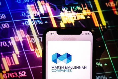 Smartphone displaying logo of Marsh and McLennan Companies Stock Photos
