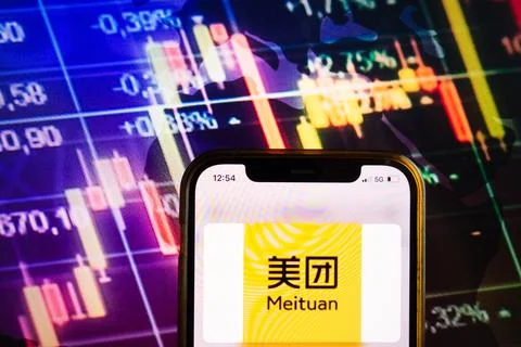 Smartphone displaying logo of Meituan platform Stock Photos