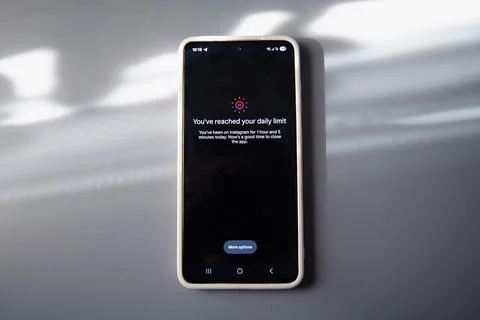 Smartphone displaying message about closing social media application Stock Photos