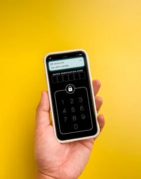 Smartphone displaying OTP verification code for two factor authentication. .. 写真素材