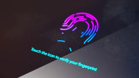 A smartphone displaying on the screen an icon to verify a fingerprint. Security. Stock Footage 145764133