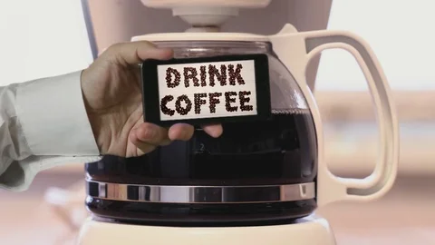 Smartphone Drink Coffee Message and Coffee Brewer Stock Footage 82072938