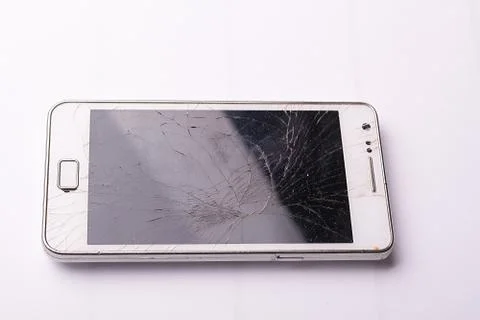 Smartphone drop to the floor and screen damage broken on white background Stock Photos
