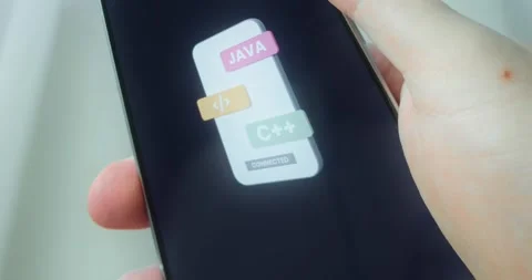 Smartphone with elements related to programming languages and connectivity Stock Footage 313443963