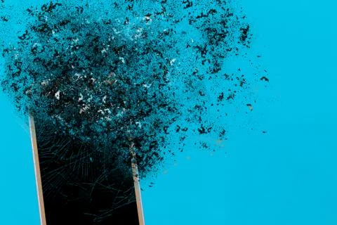 Smartphone explosion on blue background. Edit by using explosion effect Stock Photos