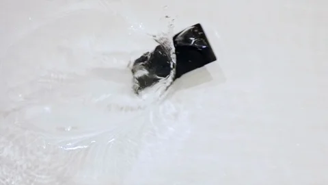 Smartphone falls into the water. Stock Footage 98952466