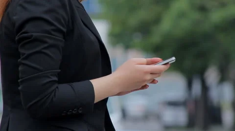 Smartphone in female hands Stock Footage 63375834
