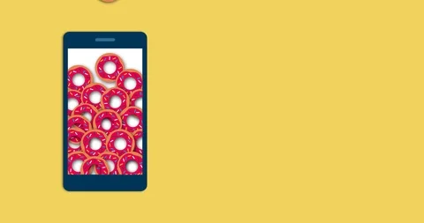 Smartphone filled with donuts Stock Footage 118090938
