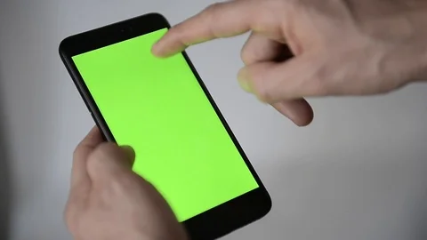 Smartphone With Green Screen and Hands Detail Stock Footage 97700547