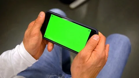 Smartphone green screen close up, man in office Stock-Footage 125928207