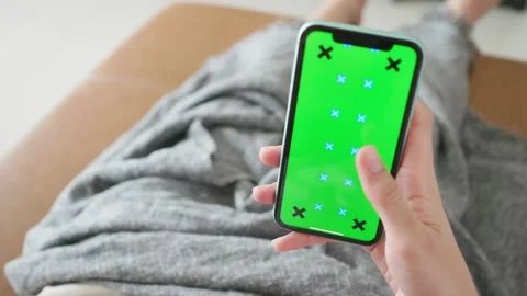Smartphone with Green Screen on Couch Stock Footage 316073105